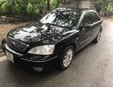 Ford Mondeo 2.0AT 2005 - Cần bán Ford Mondeo số tự động, máy 2.0, fom mới, đèn 2 vạch, năm 2005 màu đen, giá tốt