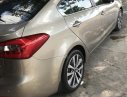 Kia K3 2014 - Cần bán Kia K3 đời 2014, màu vàng