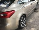 Kia K3   2014 - Cần bán lại xe Kia K3 đời 2014, màu vàng giá cạnh tranh 