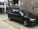 Mazda 323   1999 - Bán xe Mazda 323 đời 1999, màu đen xe gia đình