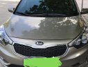 Kia K3 2014 - Cần bán Kia K3 đời 2014, màu vàng