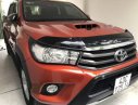 Toyota Hilux   2016 - Cần bán Toyota Hilux đời 2016, màu đỏ xe gia đình, giá 605tr