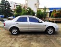 Mazda 323 2003 - Cần Bán Mazda 323 sản xuất 2003, màu bạc, xe gia đình đi