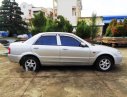 Mazda 323 2003 - Cần bán lại xe Mazda 323 đời 2003, màu bạc xe gia đình