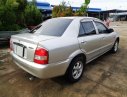 Mazda 323 2003 - Cần Bán Mazda 323 sản xuất 2003, màu bạc, xe gia đình đi