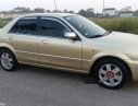 Ford Laser  1.8MT 2003 - Cần bán Ford Laser 1.8MT năm 2003, màu vàng chính chủ giá cạnh tranh