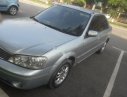 Ford Laser LXi 1.6 MT 2004 - Cần bán gấp Ford Laser LXi 1.6 MT 2004, màu bạc như mới