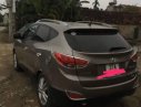 Hyundai Tucson 2011 - Cần bán lại xe Hyundai Tucson sản xuất 2011, màu nâu, 530tr