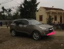 Hyundai Tucson 2011 - Cần bán lại xe Hyundai Tucson sản xuất 2011, màu nâu, 530tr