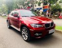 BMW X6 xDrive50i 2010 - Bán BMW X6 đỏ sx 2010, xe nguyên đai nguyên kiện đẹp
