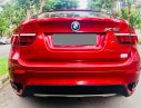 BMW X6 xDrive50i 2010 - Bán BMW X6 đỏ sx 2010, xe nguyên đai nguyên kiện đẹp
