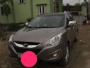 Hyundai Tucson 2011 - Cần bán lại xe Hyundai Tucson sản xuất 2011, màu nâu, 530tr