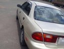 Mazda 323 1995 - Bán xe Mazda 323 năm 1995, màu vàng, nhập khẩu 