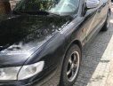 Mazda 626 2002 - Cần bán gấp Mazda 626 đời 2002, màu đen, giá rẻ