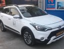 Hyundai i20 Active AT 2015 - Cần bán lại xe Hyundai i20 Active AT sản xuất năm 2015, màu trắng 