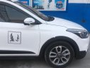 Hyundai i20 Active AT 2015 - Cần bán lại xe Hyundai i20 Active AT sản xuất năm 2015, màu trắng 