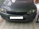 Ford Laser 1.6MT 2000 - Bán xe Ford Laser 1.6 số sàn đời 2000, màu xám lông chuột, chạy còn rất ngọt ngào, lái nhẹ, lướt êm