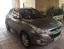 Hyundai Tucson 2011 - Chính chủ bán ô tô Hyundai Tucson 2011, màu xám