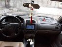 Mazda 323 2002 - Chính chủ bán ô tô Mazda 323 sản xuất năm 2002, màu trắng