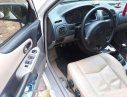 Mazda 323 2002 - Chính chủ bán ô tô Mazda 323 sản xuất năm 2002, màu trắng