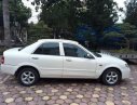 Mazda 323 2002 - Chính chủ bán ô tô Mazda 323 sản xuất năm 2002, màu trắng