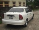 Daewoo Lanos LS 2002 - Cần bán gấp Daewoo Lanos LS sản xuất năm 2002, màu trắng