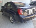 Daewoo Lacetti EX 1.6 MT 2005 - Bán Daewoo Lacetti EX 1.6 MT sản xuất năm 2005, màu đen, 135 triệu