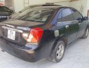 Daewoo Lacetti EX 1.6 MT 2005 - Bán Daewoo Lacetti EX 1.6 MT sản xuất năm 2005, màu đen, 135 triệu