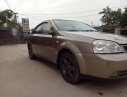 Daewoo Lacetti CDX 2005 - Cần bán Daewoo Lacetti CDX năm 2005, màu vàng, giá 128tr