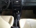 Mazda 323 1999 - Bán xe Mazda 323 SX 1999, màu đen