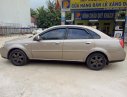 Daewoo Lacetti CDX 2005 - Cần bán Daewoo Lacetti CDX năm 2005, màu vàng, giá 128tr