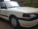 Mazda 323  MT 1995 - Cần bán xe Mazda 323 MT năm 1995, màu trắng, mọi chức năng sử dụng bình thường