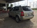 Hyundai Tucson 2009 - Bán lại xe Hyundai Tucson đời 2009, màu vàng, nhập khẩu