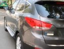 Hyundai Tucson AT 2009 - Cần bán lại xe Hyundai Tucson AT 2009, màu xám 