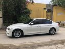 BMW 3 Series  320i  2013 - Bán BMW 3 Series 320i năm sản xuất 2013, màu trắng