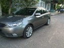 Kia Forte AT 2010 - Cần bán xe Kia Forte AT đời 2010, màu xám xe gia đình