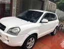 Hyundai Tucson 2.0   2009 - Cần bán gấp Hyundai Tucson 2.0 sản xuất 2009, màu trắng, nhập khẩu  