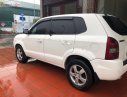 Hyundai Tucson 2.0   2009 - Cần bán gấp Hyundai Tucson 2.0 sản xuất 2009, màu trắng, nhập khẩu  