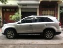 Kia Sorento AT 2014 - Cần bán Kia Sorento AT năm 2014, màu bạc số tự động, giá chỉ 715 triệu