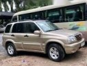 Suzuki Grand vitara  AT 2003 - Cần bán lại xe Suzuki Grand vitara AT năm 2003, màu vàng số tự động