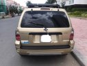 Ford Escape 2.3 AT 2005 - Bán xe Ford Escape 2.3 AT năm 2005, màu vàng giá cạnh tranh