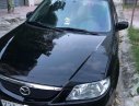 Mazda 323 2004 - Bán Mazda 323 năm 2004, màu đen xe gia đình