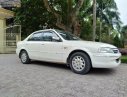 Ford Laser Delu 1.6 MT 2000 - Bán Ford Laser Delu 1.6 MT đời 2000, màu trắng