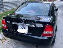 Mazda 323 2004 - Bán Mazda 323 năm 2004, màu đen xe gia đình