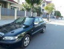 Mazda 626 2004 - Gia đình bán Mazda 626 2004, màu đen, nhập khẩu