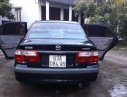Mazda 626 2001 - Cần bán Mazda 626 đời 2001, màu đen, 210tr