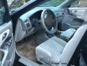 Mazda 626 2001 - Cần bán Mazda 626 đời 2001, màu đen, 210tr