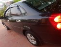 Daewoo Lacetti EX 2010 - Bán Daewoo Lacetti EX năm sản xuất 2010, màu đen xe gia đình