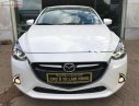 Mazda 2 1.5 AT 2016 - Cần bán gấp Mazda 2 1.5 AT sản xuất 2016, màu trắng chính chủ 
