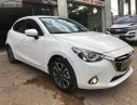 Mazda 2 1.5 AT 2016 - Cần bán gấp Mazda 2 1.5 AT sản xuất 2016, màu trắng chính chủ 